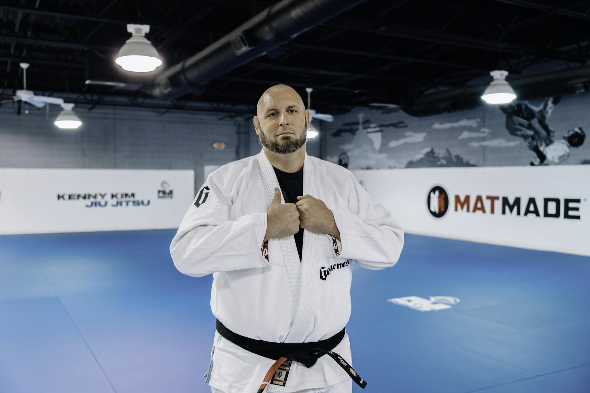 Kenny Seger standing on the mats at Kenny Kim Brazilian Jiu Jitsu in Marietta GA